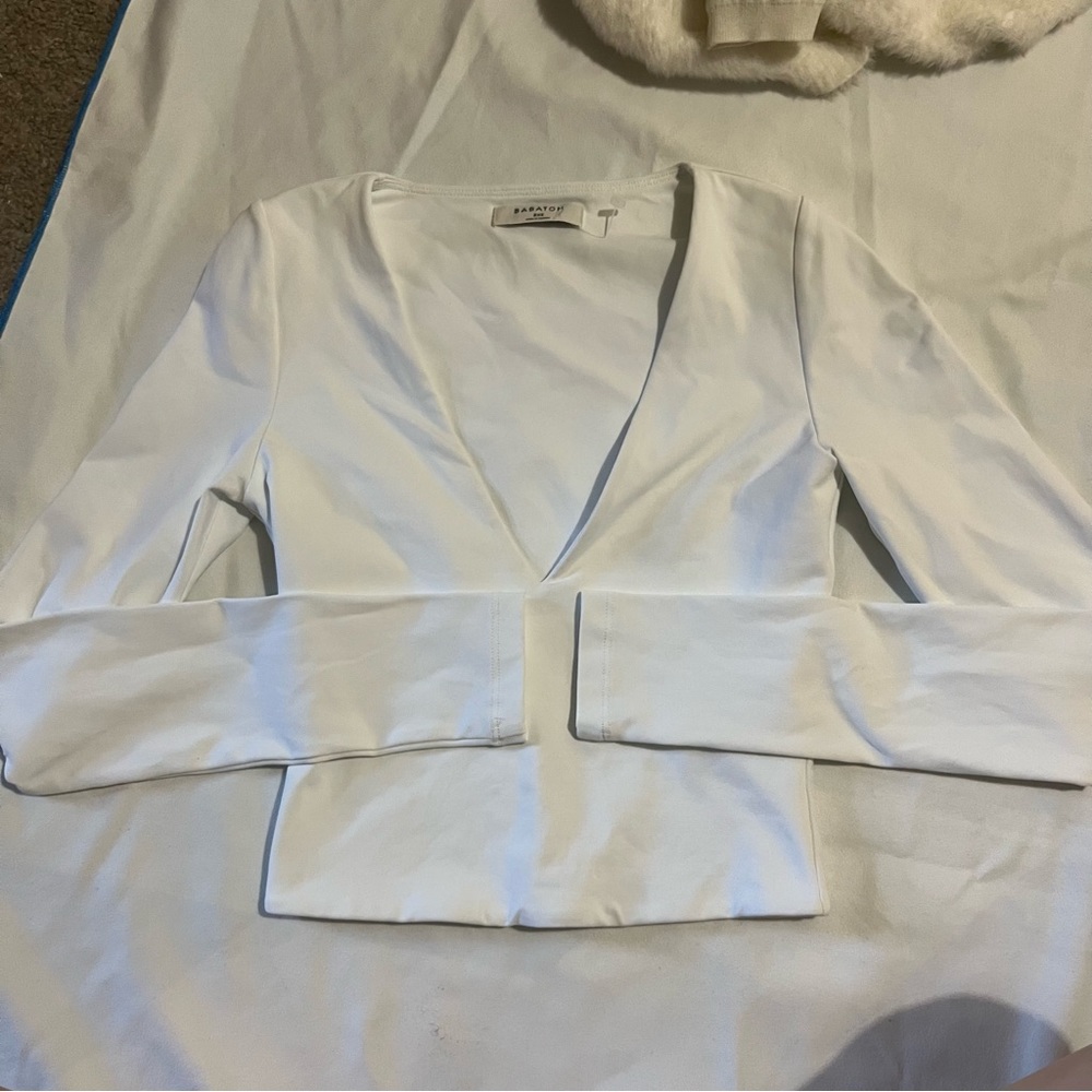 Babaton contour v neck long sleeve top